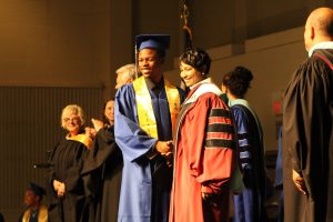 Jaylon Proctor receives his high school diploma.