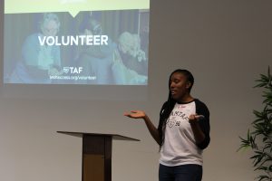 Development Associate and volunteer manager Sade gives a volunteer presentation.